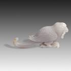 Toggle depicting Bird with Beads